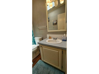 Furnished, spacious 2 bedroom 2 bath home in 55 + Resort style on Zephyrhills Municipal Golf Course in Florida - for sale on GolfHomes.com, golf home, golf lot