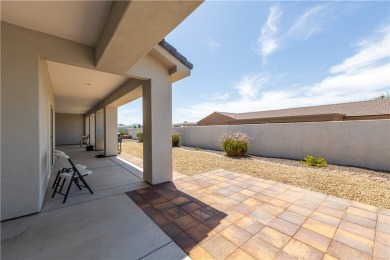 Welcome to your dream home! Nestled in a tranquil golf course on Los Lagos Golf Club in Arizona - for sale on GolfHomes.com, golf home, golf lot
