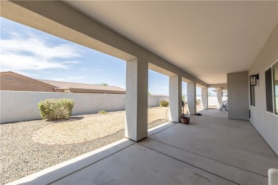 Welcome to your dream home! Nestled in a tranquil golf course on Los Lagos Golf Club in Arizona - for sale on GolfHomes.com, golf home, golf lot