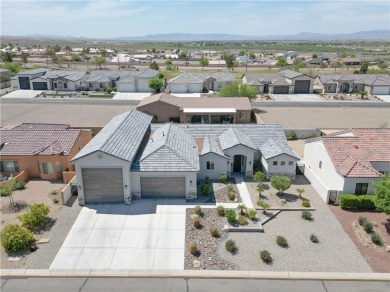 Welcome to your dream home! Nestled in a tranquil golf course on Los Lagos Golf Club in Arizona - for sale on GolfHomes.com, golf home, golf lot