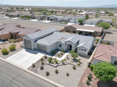 Welcome to your dream home! Nestled in a tranquil golf course on Los Lagos Golf Club in Arizona - for sale on GolfHomes.com, golf home, golf lot