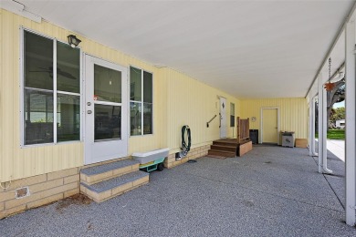 NO BOND OR CDD!! 2 Bedroom, 2 Bathroom, 1 Car Carport with on Orange Blossom Hills Golf and Country Club in Florida - for sale on GolfHomes.com, golf home, golf lot