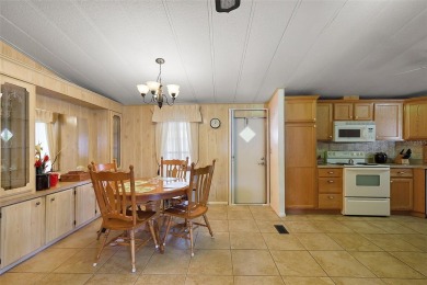 NO BOND OR CDD!! 2 Bedroom, 2 Bathroom, 1 Car Carport with on Orange Blossom Hills Golf and Country Club in Florida - for sale on GolfHomes.com, golf home, golf lot
