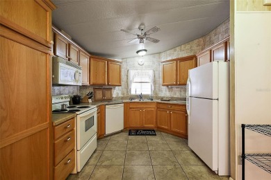 NO BOND OR CDD!! 2 Bedroom, 2 Bathroom, 1 Car Carport with on Orange Blossom Hills Golf and Country Club in Florida - for sale on GolfHomes.com, golf home, golf lot