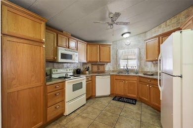 NO BOND OR CDD!! 2 Bedroom, 2 Bathroom, 1 Car Carport with on Orange Blossom Hills Golf and Country Club in Florida - for sale on GolfHomes.com, golf home, golf lot