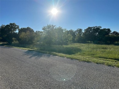 This interior lot 591 on Breezy Street in the Kings Point Cove on Hideout Golf Club and Resort  in Texas - for sale on GolfHomes.com, golf home, golf lot