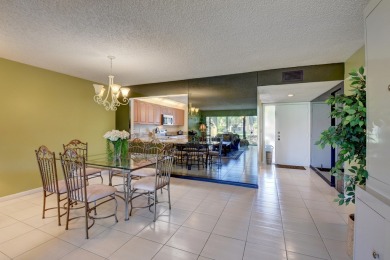 Beautiful, immaculate first floor corner unit, large open on Indian Spring Golf and Country Club in Florida - for sale on GolfHomes.com, golf home, golf lot
