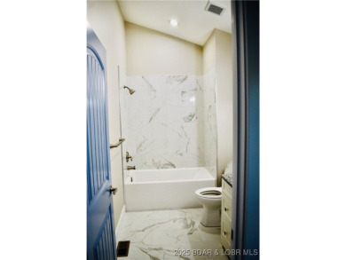 Experience unparalleled luxury living at the Estates of on The Club At Old Kinderhook in Missouri - for sale on GolfHomes.com, golf home, golf lot