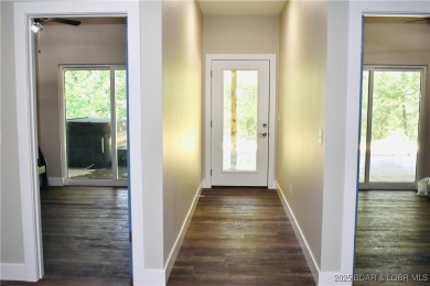 Experience unparalleled luxury living at the Estates of on The Club At Old Kinderhook in Missouri - for sale on GolfHomes.com, golf home, golf lot