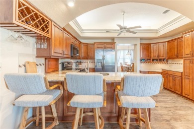 This beautifully appointed 3-bedroom, 3-bath oasis perfectly on Timber Pines Golf Course in Florida - for sale on GolfHomes.com, golf home, golf lot