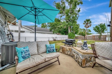 Charming fully furnished Bradenton home featuring 2 bedrooms, 1 on Bradenton Country Club in Florida - for sale on GolfHomes.com, golf home, golf lot