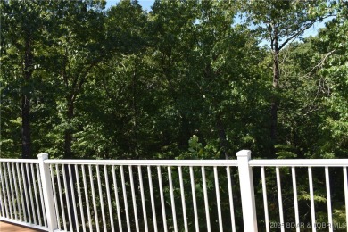 Experience unparalleled luxury living at the Estates of on The Club At Old Kinderhook in Missouri - for sale on GolfHomes.com, golf home, golf lot