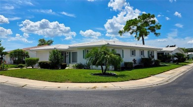 Welcome to this amazing 2-bedroom, 2-bath home, perfectly on Mainlands Golf Club in Florida - for sale on GolfHomes.com, golf home, golf lot