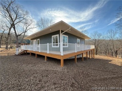 Experience unparalleled luxury living at the Estates of on The Club At Old Kinderhook in Missouri - for sale on GolfHomes.com, golf home, golf lot