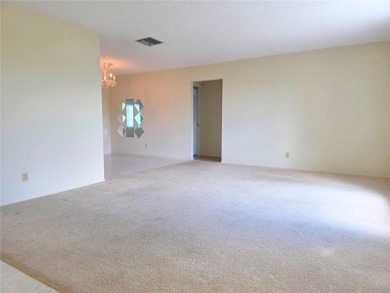 Welcome to this amazing 2-bedroom, 2-bath home, perfectly on Mainlands Golf Club in Florida - for sale on GolfHomes.com, golf home, golf lot