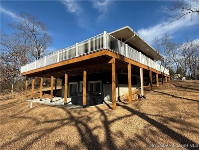 Experience unparalleled luxury living at the Estates of on The Club At Old Kinderhook in Missouri - for sale on GolfHomes.com, golf home, golf lot