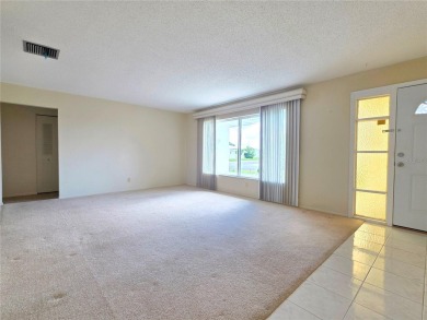 Welcome to this amazing 2-bedroom, 2-bath home, perfectly on Mainlands Golf Club in Florida - for sale on GolfHomes.com, golf home, golf lot