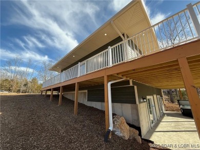 Experience unparalleled luxury living at the Estates of on The Club At Old Kinderhook in Missouri - for sale on GolfHomes.com, golf home, golf lot
