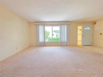 Welcome to this amazing 2-bedroom, 2-bath home, perfectly on Mainlands Golf Club in Florida - for sale on GolfHomes.com, golf home, golf lot