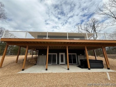 Experience unparalleled luxury living at the Estates of on The Club At Old Kinderhook in Missouri - for sale on GolfHomes.com, golf home, golf lot