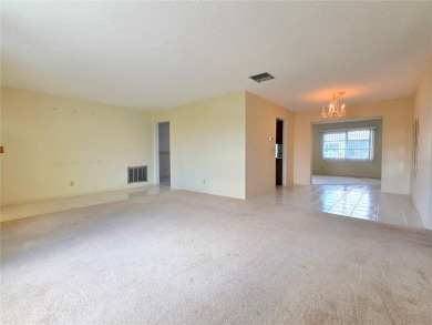 Welcome to this amazing 2-bedroom, 2-bath home, perfectly on Mainlands Golf Club in Florida - for sale on GolfHomes.com, golf home, golf lot