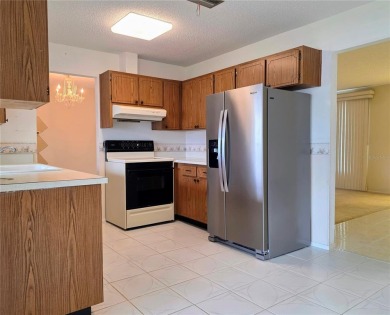 Welcome to this amazing 2-bedroom, 2-bath home, perfectly on Mainlands Golf Club in Florida - for sale on GolfHomes.com, golf home, golf lot