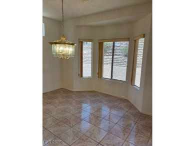 POPULAR SPACIOUS EXPANDED TAHOE MODEL LOCATED IN HIGHER UP AREA on Highland Falls Golf Club in Nevada - for sale on GolfHomes.com, golf home, golf lot