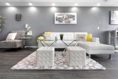 Stunning Resort-Style Condo with Designer Finishes and on Cove Cay Country Club in Florida - for sale on GolfHomes.com, golf home, golf lot