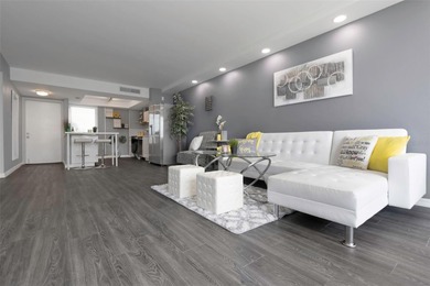 Stunning Resort-Style Condo with Designer Finishes and on Cove Cay Country Club in Florida - for sale on GolfHomes.com, golf home, golf lot