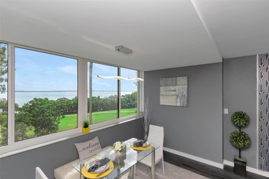 Stunning Resort-Style Condo with Designer Finishes and on Cove Cay Country Club in Florida - for sale on GolfHomes.com, golf home, golf lot