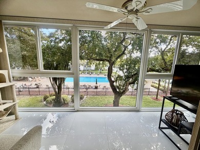 WELCOME to easy FLORIDA living in this uniquely enhanced 2/2 on Wynmoor Golf Course in Florida - for sale on GolfHomes.com, golf home, golf lot