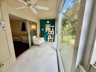 WELCOME to easy FLORIDA living in this uniquely enhanced 2/2 on Wynmoor Golf Course in Florida - for sale on GolfHomes.com, golf home, golf lot