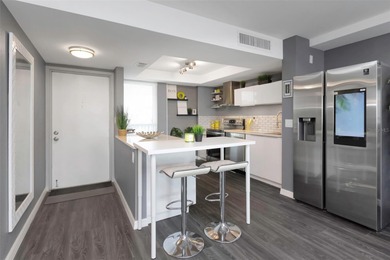 Stunning Resort-Style Condo with Designer Finishes and on Cove Cay Country Club in Florida - for sale on GolfHomes.com, golf home, golf lot