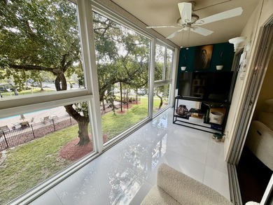 WELCOME to easy FLORIDA living in this uniquely enhanced 2/2 on Wynmoor Golf Course in Florida - for sale on GolfHomes.com, golf home, golf lot