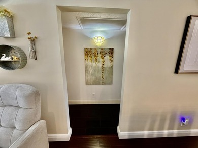 WELCOME to easy FLORIDA living in this uniquely enhanced 2/2 on Wynmoor Golf Course in Florida - for sale on GolfHomes.com, golf home, golf lot