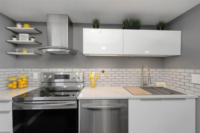 Stunning Resort-Style Condo with Designer Finishes and on Cove Cay Country Club in Florida - for sale on GolfHomes.com, golf home, golf lot
