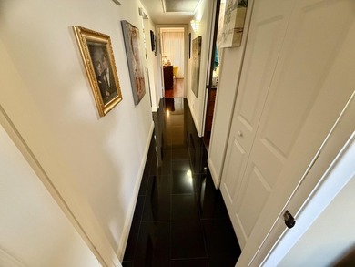 WELCOME to easy FLORIDA living in this uniquely enhanced 2/2 on Wynmoor Golf Course in Florida - for sale on GolfHomes.com, golf home, golf lot