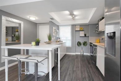 Stunning Resort-Style Condo with Designer Finishes and on Cove Cay Country Club in Florida - for sale on GolfHomes.com, golf home, golf lot