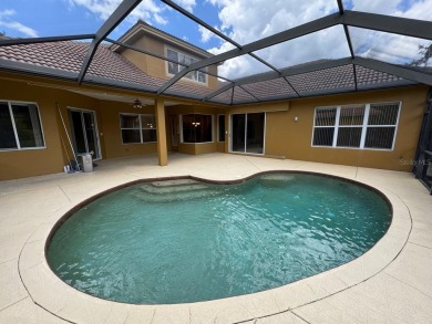 Captivating home located behind the gates of the tranquil Salano on Fox Hollow Golf Club in Florida - for sale on GolfHomes.com, golf home, golf lot