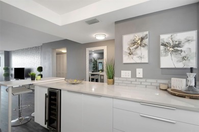 Stunning Resort-Style Condo with Designer Finishes and on Cove Cay Country Club in Florida - for sale on GolfHomes.com, golf home, golf lot