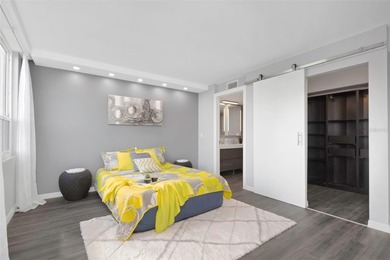 Stunning Resort-Style Condo with Designer Finishes and on Cove Cay Country Club in Florida - for sale on GolfHomes.com, golf home, golf lot