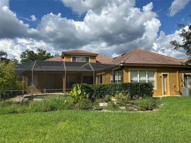 Captivating home located behind the gates of the tranquil Salano on Fox Hollow Golf Club in Florida - for sale on GolfHomes.com, golf home, golf lot