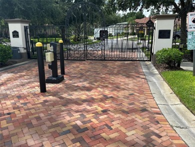 Captivating home located behind the gates of the tranquil Salano on Fox Hollow Golf Club in Florida - for sale on GolfHomes.com, golf home, golf lot