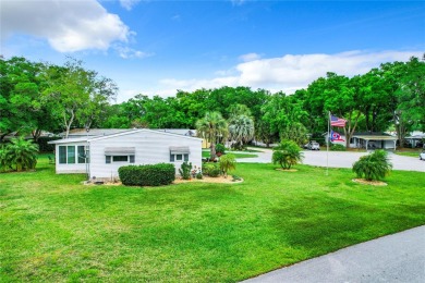 This furnished home is located on a large, beautiful landscaped on Plantation Golf Club in Florida - for sale on GolfHomes.com, golf home, golf lot