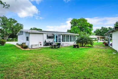 This furnished home is located on a large, beautiful landscaped on Plantation Golf Club in Florida - for sale on GolfHomes.com, golf home, golf lot