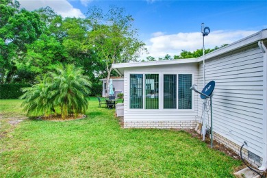 This furnished home is located on a large, beautiful landscaped on Plantation Golf Club in Florida - for sale on GolfHomes.com, golf home, golf lot