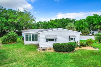 This furnished home is located on a large, beautiful landscaped on Plantation Golf Club in Florida - for sale on GolfHomes.com, golf home, golf lot