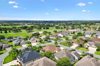 POOL HOME with GOLF CART GARAGE. On a desirable corner lot in on The Links of Spruce Creek in Florida - for sale on GolfHomes.com, golf home, golf lot