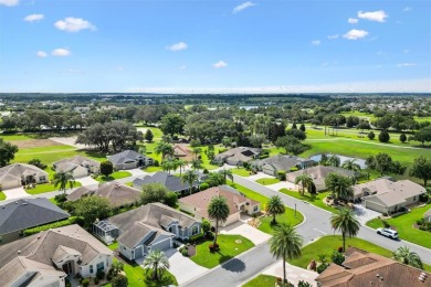 POOL HOME with GOLF CART GARAGE. On a desirable corner lot in on The Links of Spruce Creek in Florida - for sale on GolfHomes.com, golf home, golf lot