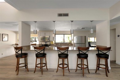 Stunning Resort-Style Condo with Designer Finishes and on Cove Cay Country Club in Florida - for sale on GolfHomes.com, golf home, golf lot